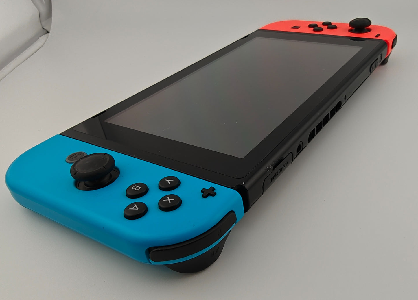 Nintendo Switch 1st Gen with Neon Red Blue Joy-Con HAC-001 New